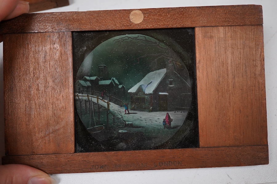 A quantity of magic lantern slides, including a moving slide. Condition - poor to fair.